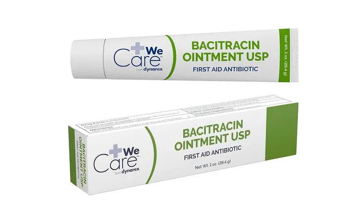 Bacitracin A tube and box of We Care Bacitracin Ointment USP, 1 oz (28.4 g), labeled as a first aid antibiotic.