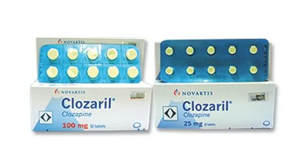 Two boxes and blister packs of Novartis Clozaril (Clozapine) tablets, 100 mg and 25 mg, typically used for schizophrenia.