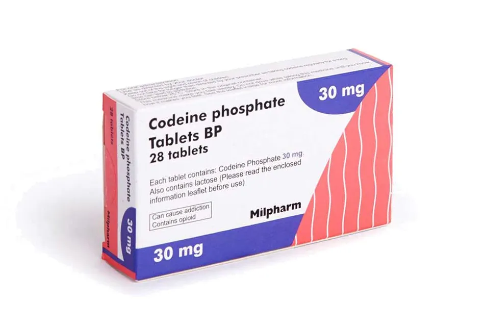 A box of Milpharm Codeine Phosphate Tablets BP 30 mg, containing 28 tablets, with a warning about addiction and opioid content.