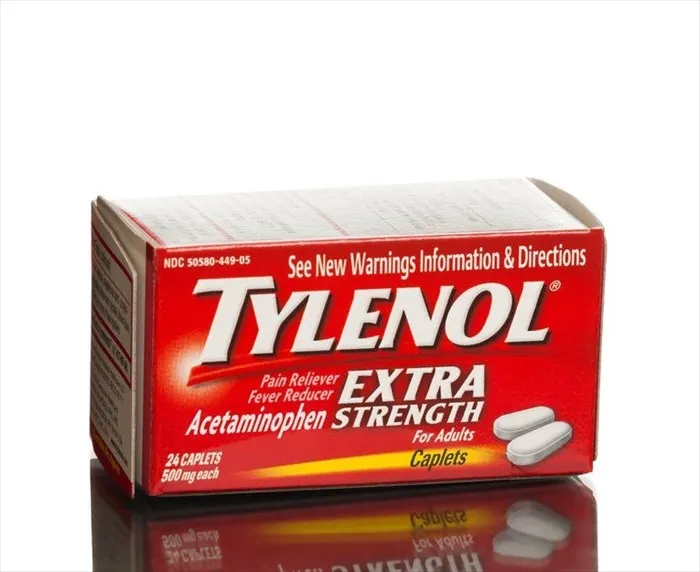 Acetaminophen A red box of Tylenol Extra Strength Acetaminophen 500 mg caplets, containing 24 caplets, indicating its use as a pain reliever and fever reducer for adults.