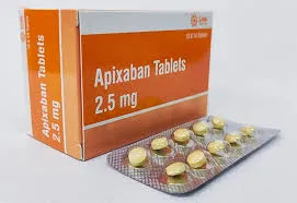 Apixaban 2.5 mg tablets in a blister pack with the medicine box in the background