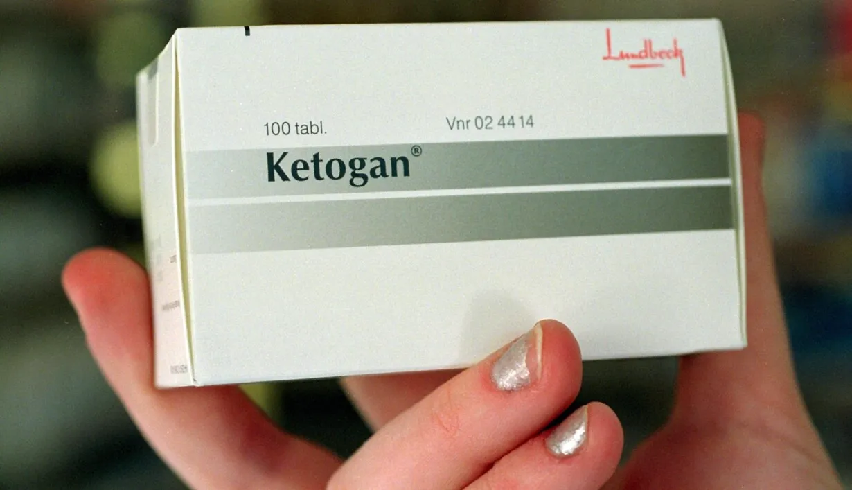 Ketobemidone A hand holding a box of Ketogan tablets by Lundbeck, which contains 100 tablets of Ketobemidone.