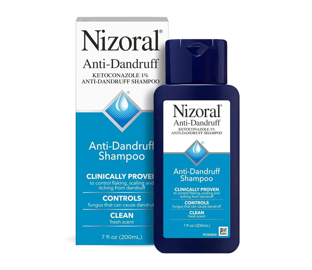 A box and bottle of Nizoral Anti-Dandruff Shampoo, containing Ketoconazole 1%, used to control flaking and itching.
