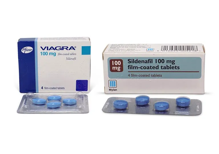 A box of Pfizer Viagra 100 mg film-coated tablets and a box of Mylan Sildenafil 100 mg film-coated tablets, with their respective blister packs.