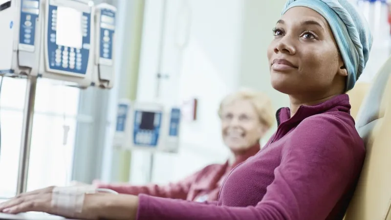 Cancer patient receiving intravenous chemotherapy for stage 2 stomach cancer treatment