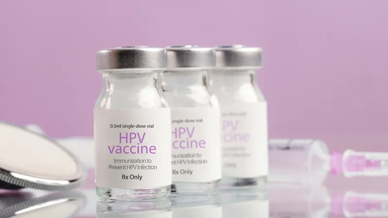 Close-up of HPV vaccine vials used to immunize against HPV infection and reduce cervical cancer incidence