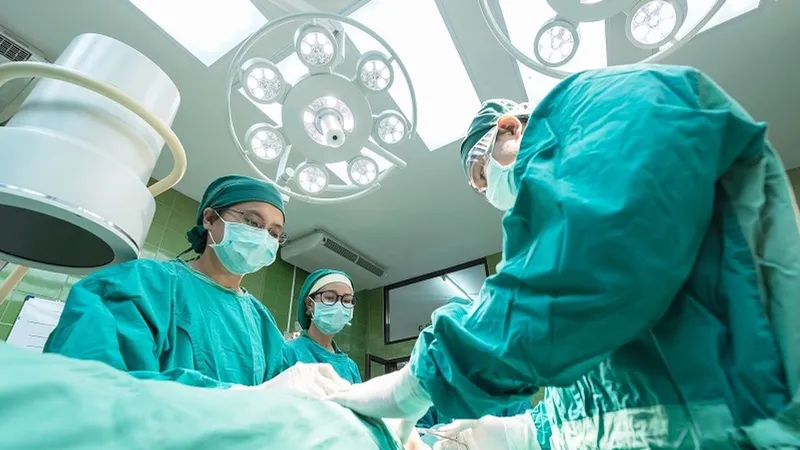 Surgeons performing surgery as a treatment option for signet ring cell carcinoma