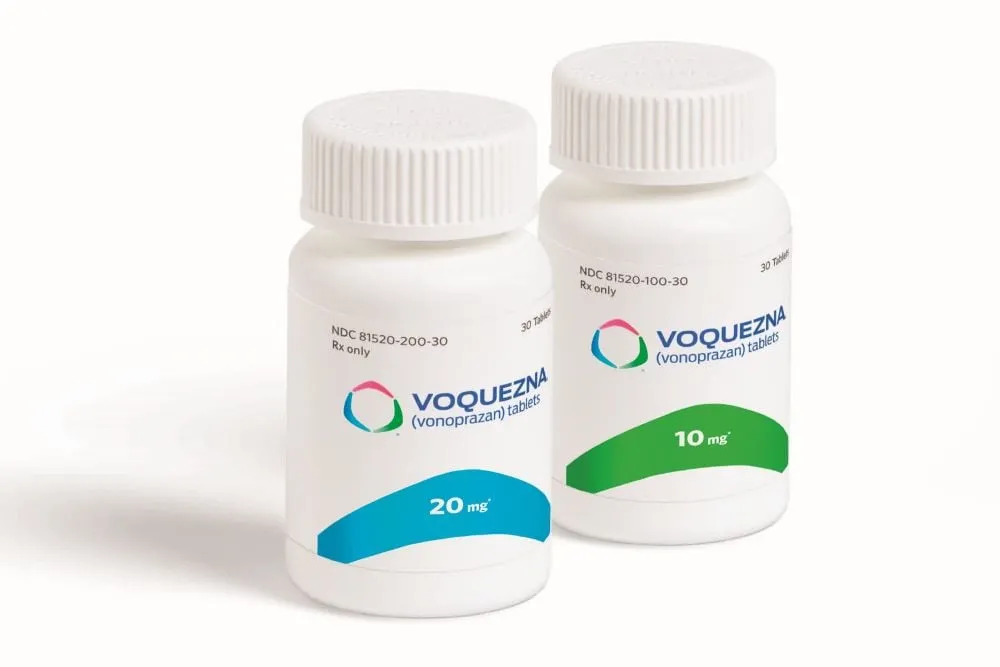 Vonoprazan Two bottles of Voquezna (vonoprazan) tablets, showing both the 10 mg and 20 mg dosages.