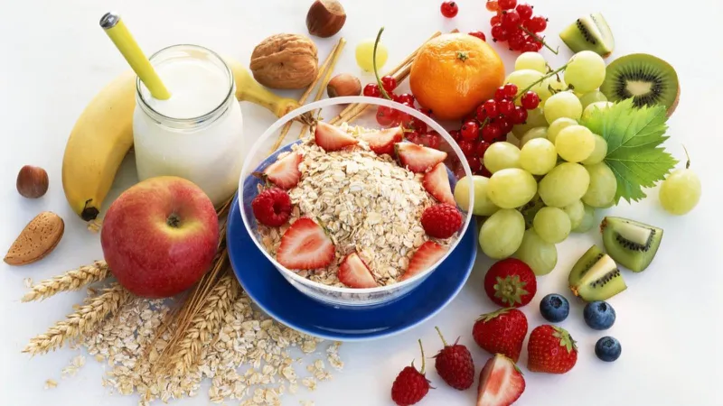 Healthy breakfast with fruits, oats, and milk representing balanced nutrition for Churg-Strauss patients
