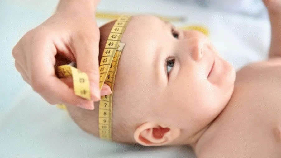 Infant with abnormal head enlargement, a common symptom of ependymoma