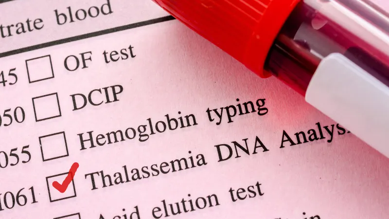 Blood test form showing Thalassemia DNA analysis, a genetic cause of hemolytic anemia.