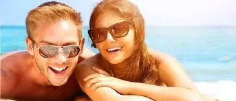 People wearing sunglasses outdoors to protect their eyes from sunlight